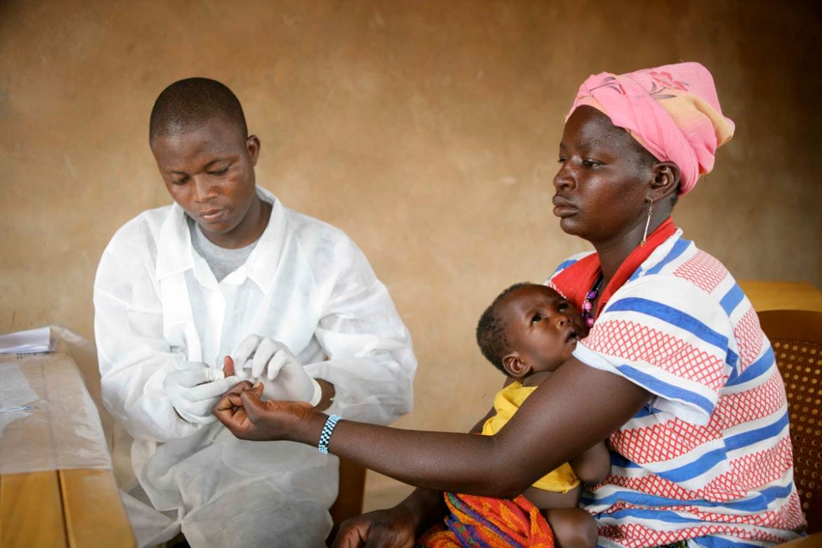 An HIV/AIDS test in progress. HIV/AIDS Prevention care and treatment in Burkina Faso, Africa HIV:
More than 117,500 patients, including 35,131 orphaned children are being cared for through a UNDP programme of support to community organizations involved in addressing HIV and AIDS and providing psychological support to AIDS patients. The programme supports 172 civil society organizations and six national networks of associations, helping to carry out 90 percent of all HIV tests nationwide. It trains all of these associations and connects them with one another. UNDP established the programme and mobilized funding from partners like France, Belgium, Austria and the Global Fund.